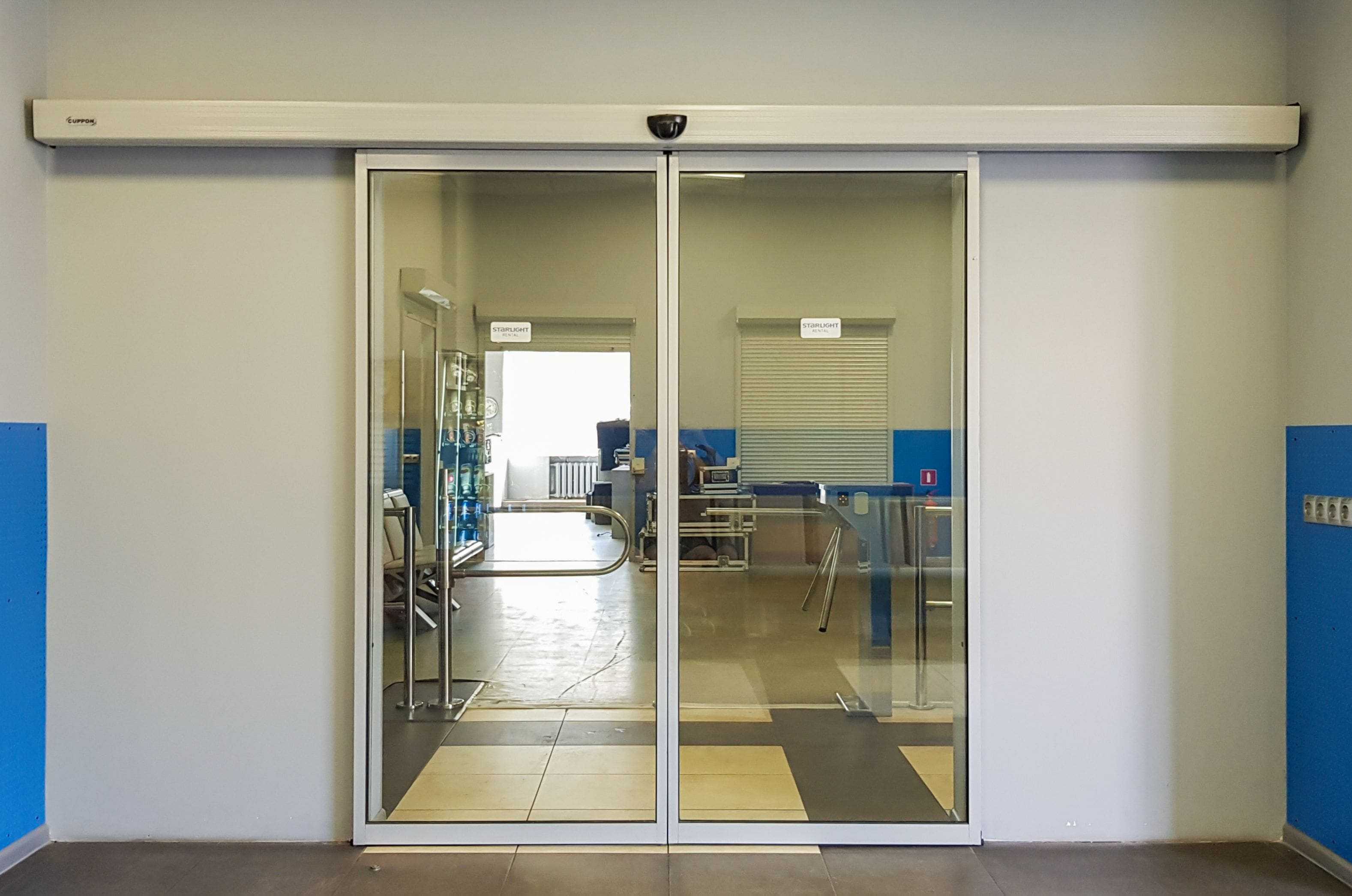 sliding automatic glass doors interior of waiting area sliding automatic glass doors interior of waiting area