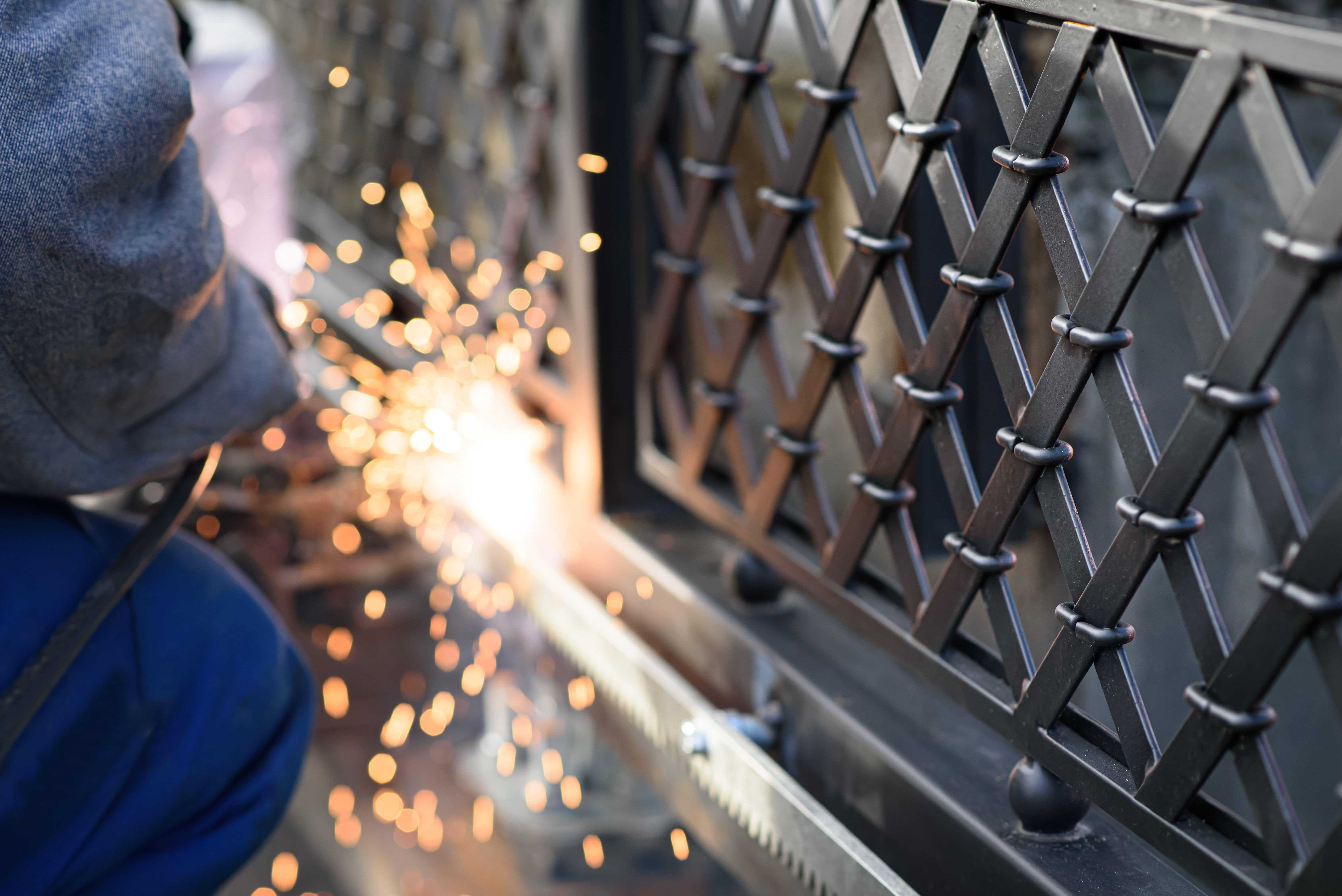 installing steel gate system and tracks