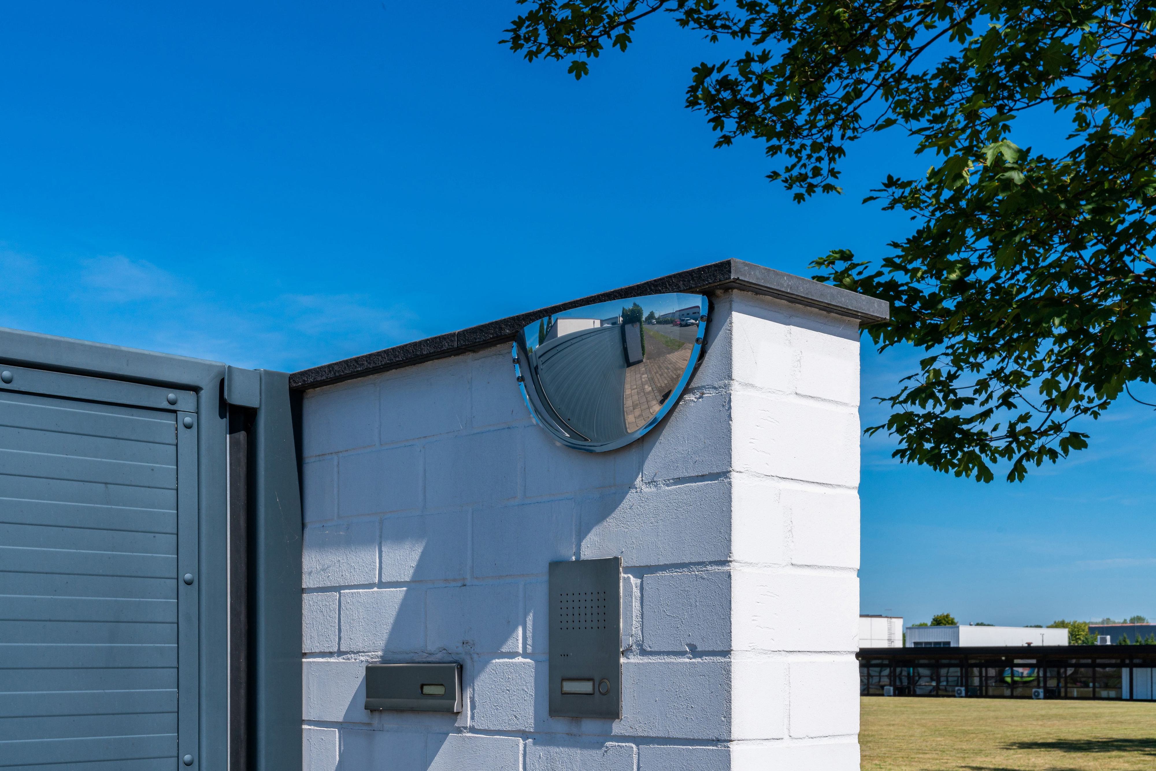 Gate with intercom and mirror