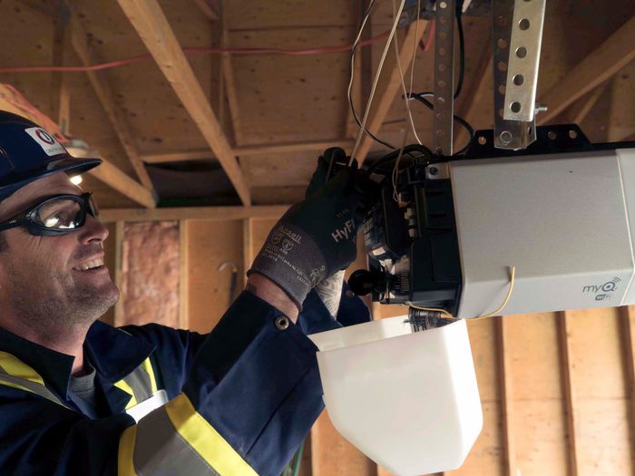 CDS technician installing garage door opener