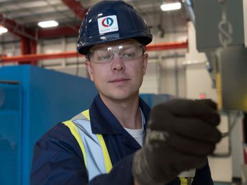 CDS technician installing pedestrian door component