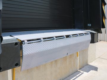 Dock leveler platform at a commercial loading dock