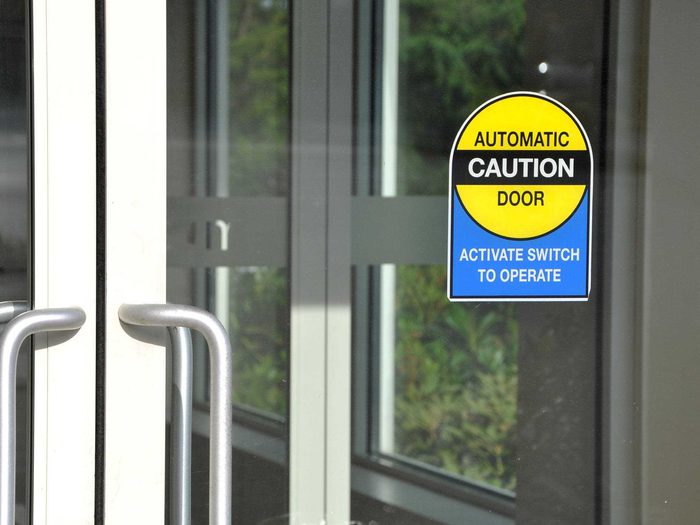 Automatic Door With Warning Sign Min