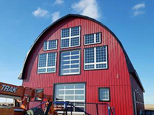 Red Barn with windows Saskatchewan Creative Door Services