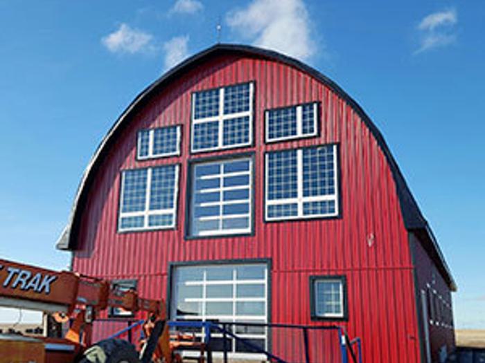 Red Barn with windows Saskatchewan Creative Door Services