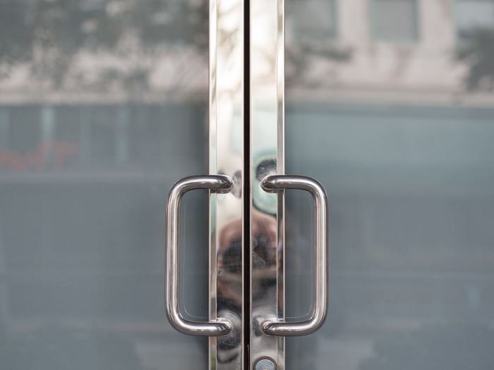 Close up of closed pedestrian doors min