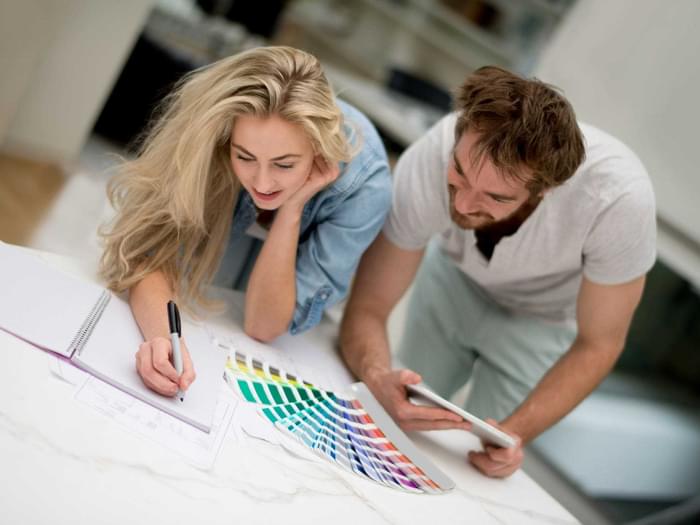 Couple Choosing Paint Colours Min