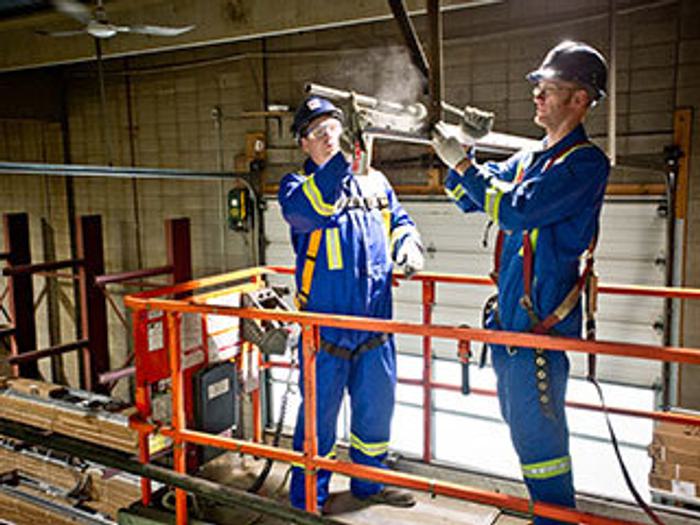 Repair Men on Scaffolding