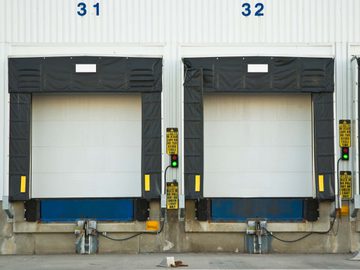 Loading docks with edge of dock levelers