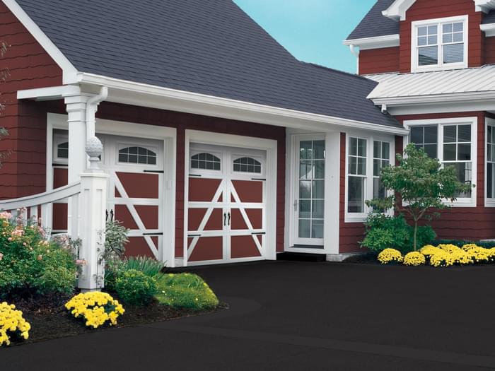 Red and white carriage house doors min