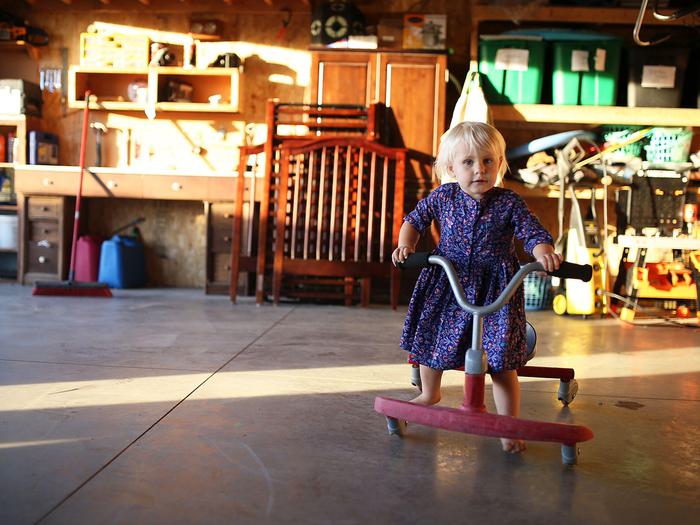 Safety Child Playing In Garage