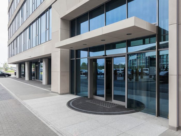 Sliding automatic doors for office building entrance