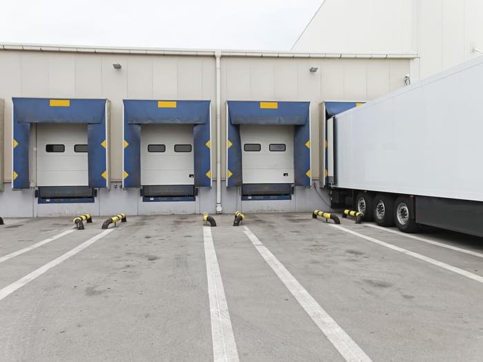 Truck docked at loading bay